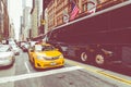 NEW YORK - SEPTEMBER 2, 2018: Yellow cab speeds through Times Sq Royalty Free Stock Photo