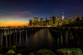 New York Skyline Cityscape Lower Manhatten World Trade Center Freedom Tower from Brooklyn Bridge Park Pier Royalty Free Stock Photo