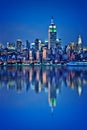 New York skyline with water reflections at night