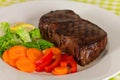 New York Steak- meat on Green Beans,Carrot,Pepper Royalty Free Stock Photo