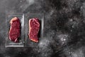 New-York  steak pack, on black dark stone table background, top view flat lay, with copy space for text Royalty Free Stock Photo