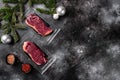 New-York steak pack new year decoration, on black dark stone table background, top view flat lay, with copy space for text Royalty Free Stock Photo