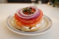 New York Style Bagel with smoked salmon with cream cheese, tomato, onion and capers Royalty Free Stock Photo