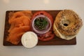 New York Style Bagel with smoked salmon with cream cheese, tomato, onion and capers Royalty Free Stock Photo