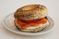 New York Style Bagel with smoked salmon, cream cheese, tomato, onion and capers Royalty Free Stock Photo