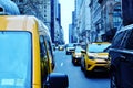 New York Taxi Cab on Busy Rush Hour Street Skyscraper Background Royalty Free Stock Photo