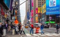 New York, Times Square. Scyscrapers, colorful neon lights, ads, cars and people Royalty Free Stock Photo