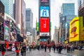 New York, Times Square. Scyscrapers, colorful neon lights, ads and people Royalty Free Stock Photo