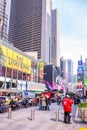 New York, Times Square. Scyscrapers, colorful neon lights, ads and people Royalty Free Stock Photo