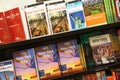 New York tourist guides on bookshelves