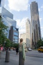 NEW YORK, UNITED STATES - Jul 02, 2012: Woman in fancy dress sitting in Manhattan