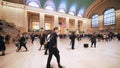 People walk at lobby hall of grand central station in New York City, United states. American city life