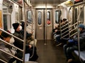 New York, United States, USA March 24, 2020: people with mask in new york subway station during coronavirus pandemic