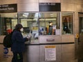 New York, United States, USA March 24, 2020: subway essential workers with mask in empty new york subway station during