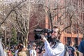 NEW YORK, USA - APRIL 14, 2018: Newyorkers and tourists in the Park, West Village, New York