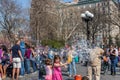 NEW YORK, USA - APRIL 14, 2018: Newyorkers and tourists in the Park, West Village, New York