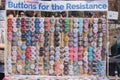 NEW YORK, USA - APRIL 14, 2018: A vendor selling anti-Trump political buttons in a park in New York City,