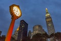 night view to empire state building with classical clock in victorian style Royalty Free Stock Photo