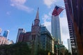 NEW YORK, USA AUGUST 25, 2018: Empire State Building and US Flag Royalty Free Stock Photo