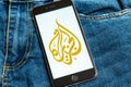 Black phone with logo of news media Al Jazeera on the screen. Royalty Free Stock Photo