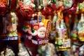 New York, USA - December 25, 2019: Lot colorful and multicolor christmas tree toys on Xmas market in New York. Rich selection