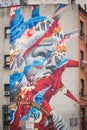 NEW YORK, USA - FEBRUARY 23, 2018: Giant street art of the Statue of Liberty on the wall of a building in Little Italy Manhattan