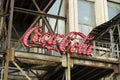 New York, USA - July 15, 2022: Old vintage sign of Coca-Cola drink on the facade of the building. Retro, design, style