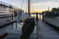 New York / Usa - July 28 2020: Pier waterfront view to the harbor at sunset. Boats docked at Chelsea Piers along the Hudson River Royalty Free Stock Photo