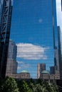 Skyscrapers reflected in a New York City building made from glass Royalty Free Stock Photo