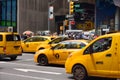 NEW YORK, USA - July 10, 2019: Yellow cab cars in traffic on Times Square in Manhattan, New York, USA Royalty Free Stock Photo