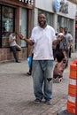 NEW YORK, USA - JUNE 15, 2015 - Homeless smiling for the camera in Harlem on weekday