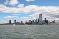 New York,USA-June 15 ,2018 :Look on the sailboat is cruising in New York harbor buildings of Manhattan island in the background Royalty Free Stock Photo