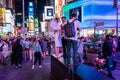 New York, USA - June 21, 2019: People crowds and newlyweds in the light of the evening in Times Square - image Royalty Free Stock Photo