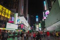 New York,USA- JUNE 15 ,2018: People visit on street Times Square at night .This Place is world's most visited tourist i Royalty Free Stock Photo