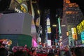 New York,USA- JUNE 15 ,2018: People visit on street Times Square at night .This Place is world's most visited tourist i Royalty Free Stock Photo