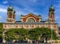 New York, USA June 1, 2023: Photograph of the Ellis Island Immigration Museum under a beautiful blue sky. Royalty Free Stock Photo