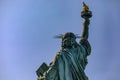 New York, USA June 1, 2023: The Statue of Liberty with its torch symbolizing the freedom and democracy of Manhattan. Royalty Free Stock Photo