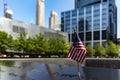 New York, USA June 1, 2023: U.S. flag at the World Trade Center memorial, honoring the victims of the terrorist attack of 11s Royalty Free Stock Photo