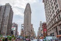 New York, USA - June 12, 2014: View of Flatiron Building on the street of Broadway in New York City Royalty Free Stock Photo