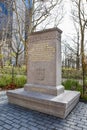 New York, USA. The limestone stele Walloon Settlers Memorial, in Battery Park.