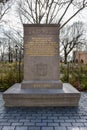 New York, USA. The limestone stele Walloon Settlers Memorial, in Battery Park.