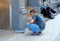 New York USA, man is painting the facade of old historical building in Soho District in Manhattan. Royalty Free Stock Photo