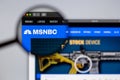 MSNBC News logo visible  through a magnifying glass. Royalty Free Stock Photo