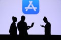 NEW YORK, USA, 25. MAY 2020: Apple Store, retail stores operated by Apple Group of business people chat on mobile phone and laptop