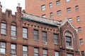 Brick apartment building with ornate exterior, Greenwich Avenue & 7th Avenue South, New York City
