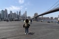 NEW YORK, USA, MAY 2 2019 - Dumbo view of Brooklyn bridge full of tourists Royalty Free Stock Photo