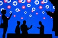 NEW YORK, USA, 25. MAY 2020: Facebook online social media and social networking Group of business people chat on mobile phone and