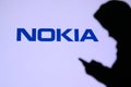 NEW YORK, USA, 25. MAY 2020: Nokia a Finnish telecommunications, technology, and electronics company Young boy chat on mobile