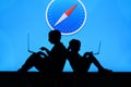 NEW YORK, USA, 25. MAY 2020: Safari graphical web browser developed by Apple Children silhouette, sitting together and playing on