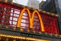 Sign with McDonald`s logo formed by many light bulbs